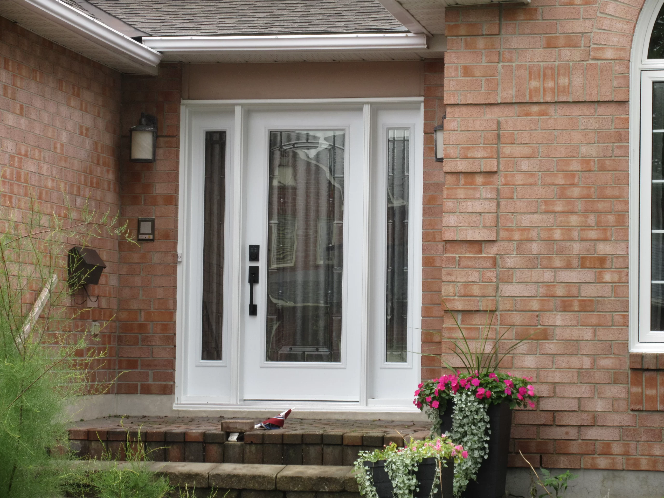 White front door with glass panels